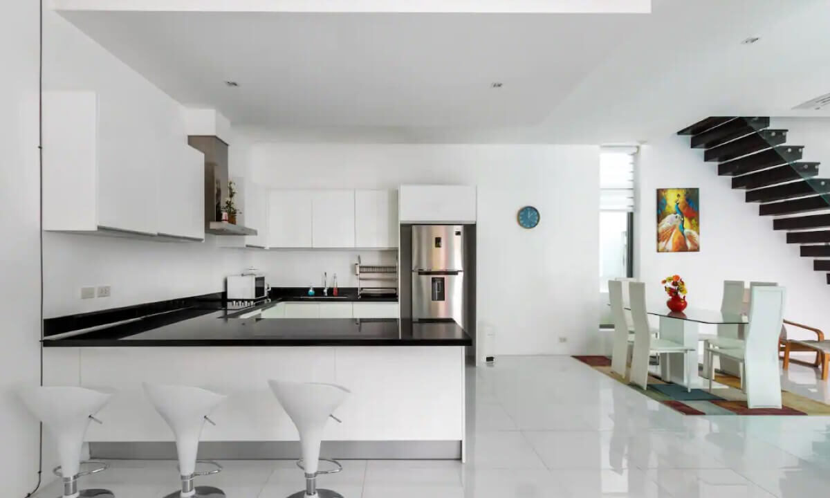 4_to_5_bedroom_modern_pool_villa_for_sale_from_owner_10_minutes_walk_kamala_beach_phuket_thai_residential_dining_area_kitchen_breakfast_bar