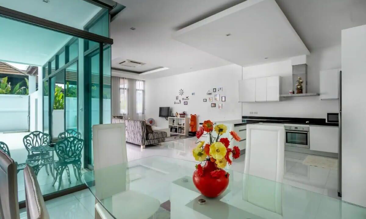 4_to_5_bedroom_modern_pool_villa_for_sale_from_owner_10_minutes_walk_kamala_beach_phuket_thai_residential_dining_area_kitchen_living_room_lounge