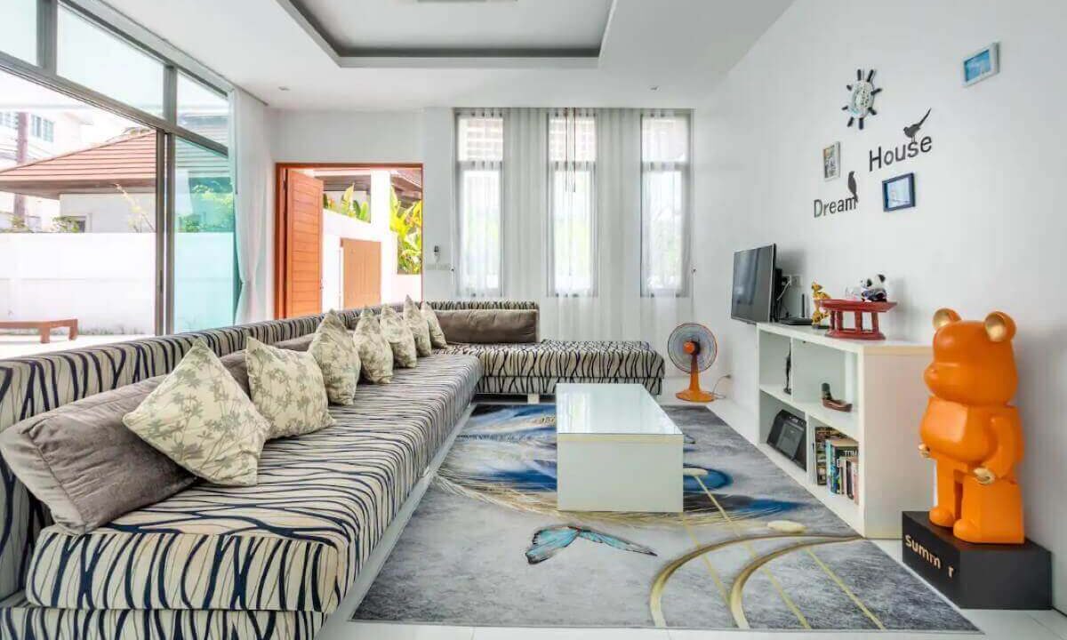 4_to_5_bedroom_modern_pool_villa_for_sale_from_owner_10_minutes_walk_kamala_beach_phuket_thai_residential_main_door_lounge_living_area
