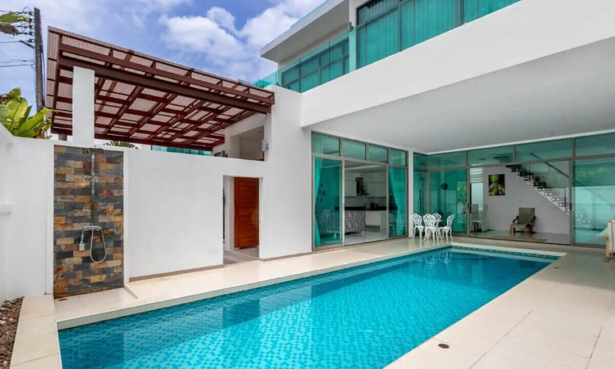 4_to_5_bedroom_modern_pool_villa_for_sale_from_owner_10_minutes_walk_kamala_beach_phuket_thai_residential_street_view_partial_undercover_pool_outdoor_shower